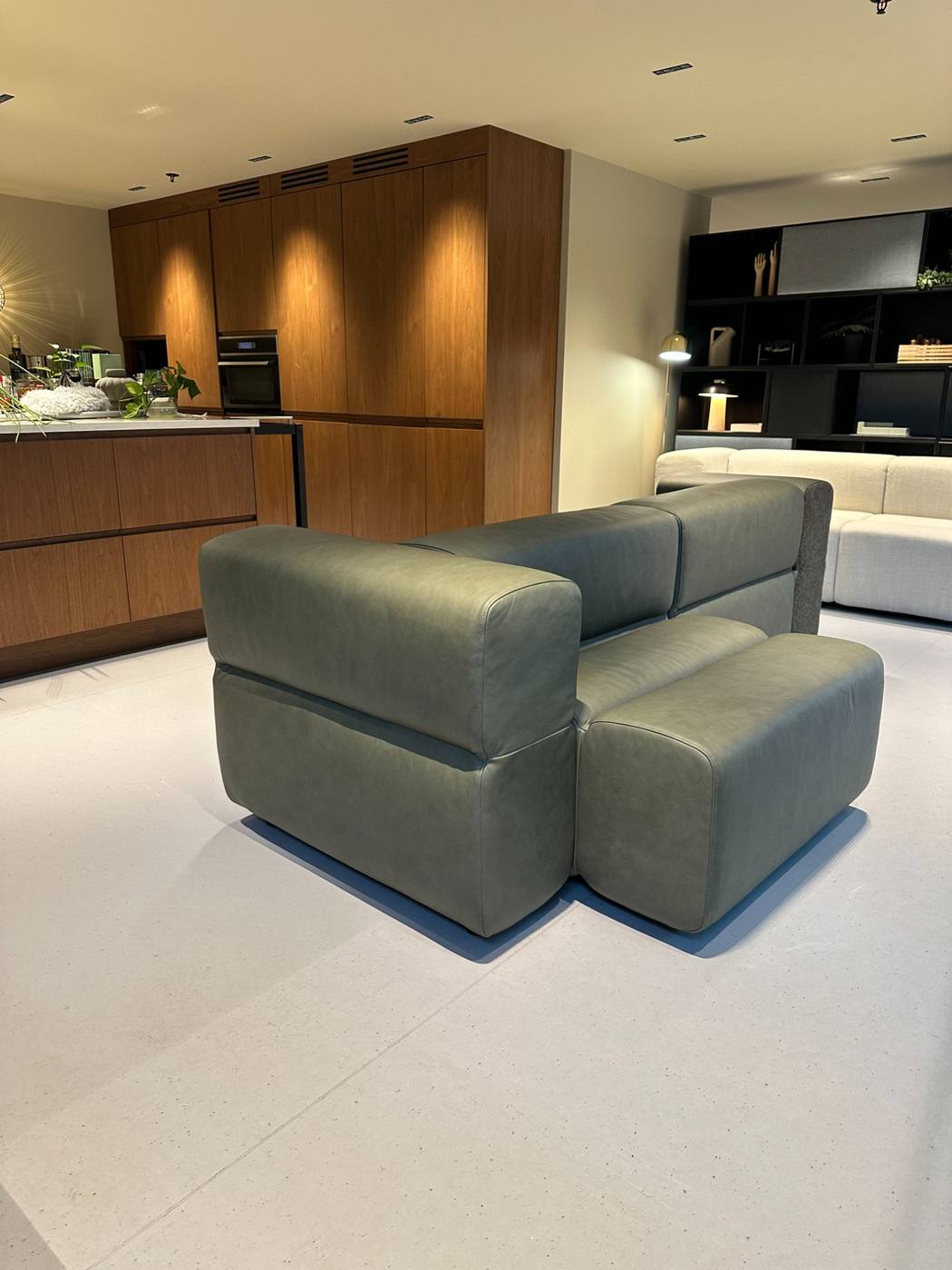 A small KEEEP seating module beside a larger sofa configuration — same module set, different solutions.
