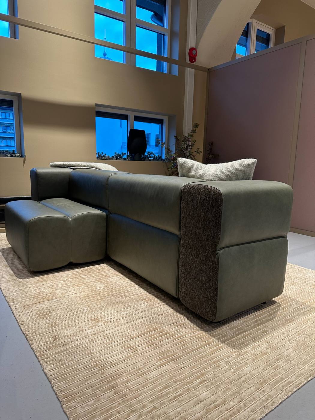 KEEEP modules in green textile — a wide view showing the system in full reach.