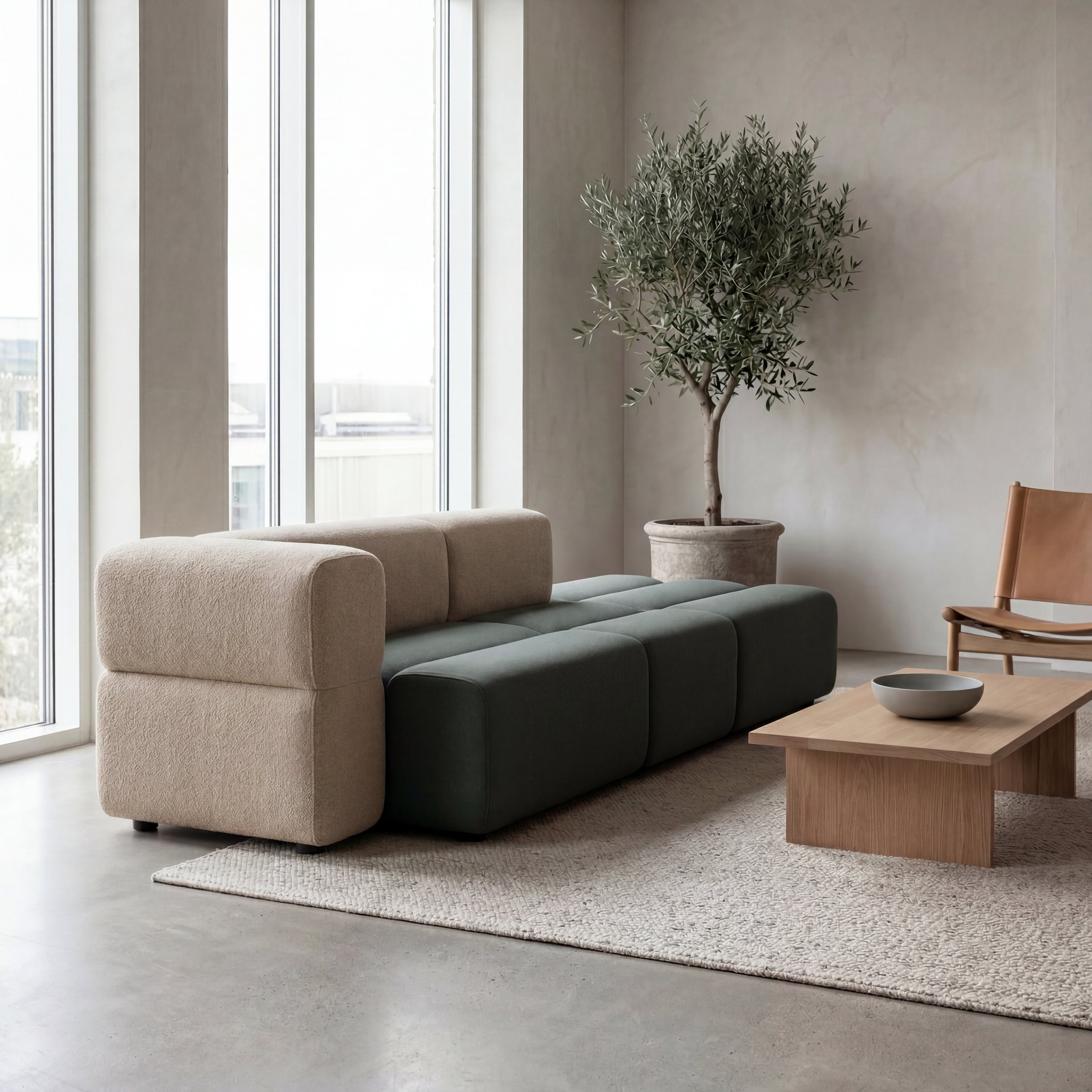After reconfiguration: half the sofa in sand, half in green — modules split along the grid.